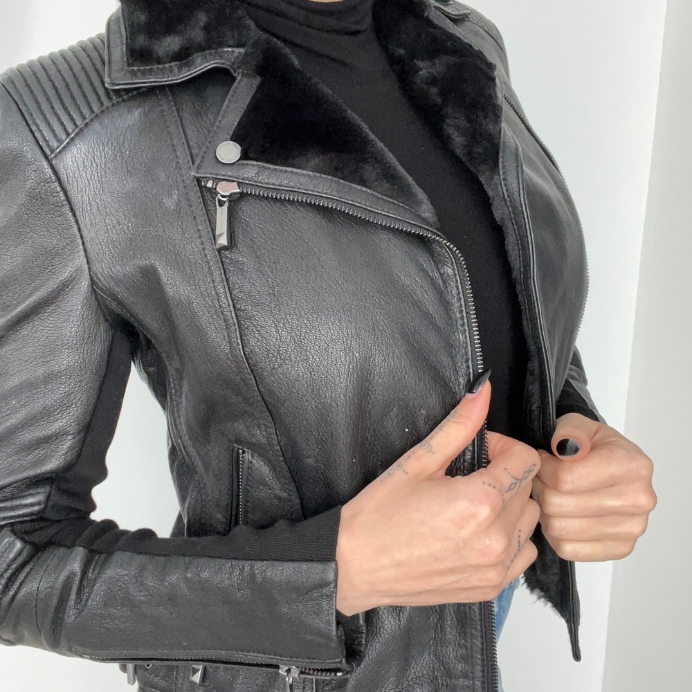 Genuine leather jacket with genuine fur collar